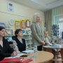 приглашенные и председатель Ирина Новикова выступает